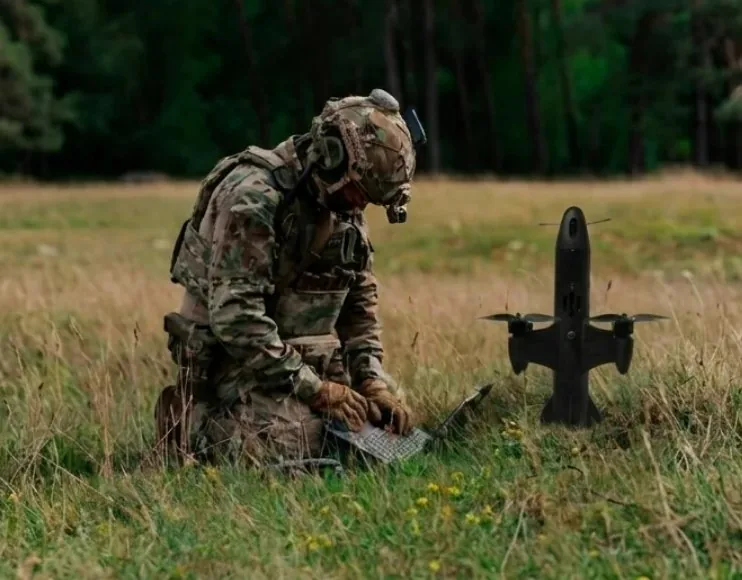 Operator preparing a ground launch with the interceptor standing on its fins